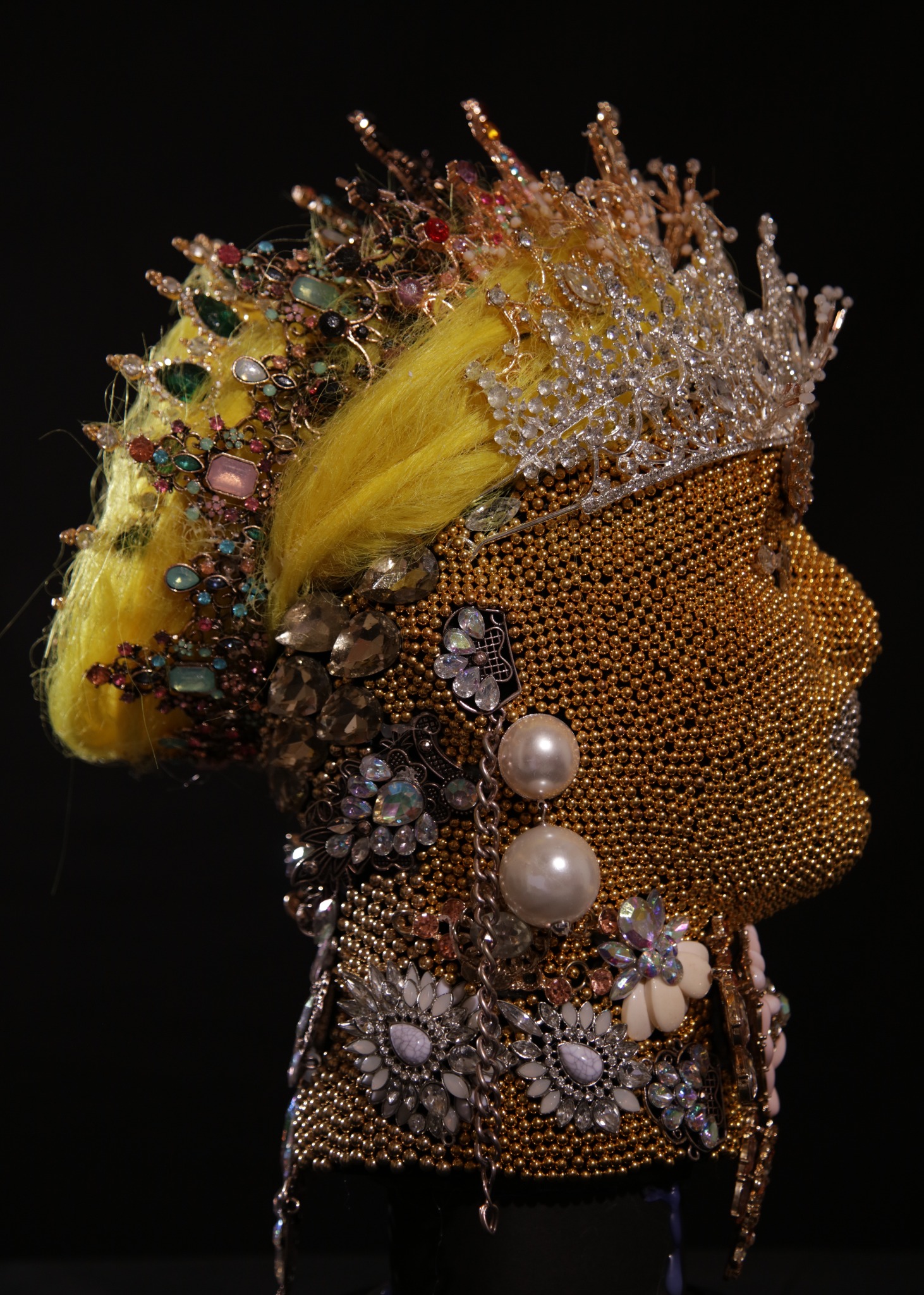 Disco Balling Heads, 2022 jeweled sculptural head with gold beaded surface, crown elements, and yellow hair